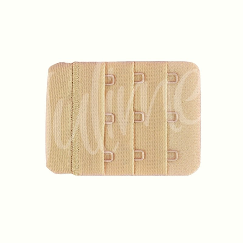 Bh forlænger med 3 hægter i beige. Tilføjer op til 5,5 cm omkreds. Udstyret med 3 hægter, ideel til bh'er med 3 lukninger. Bredde: 5 cm.