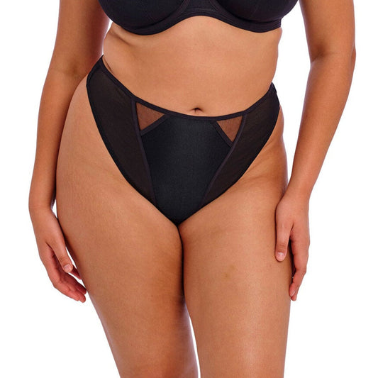 Kintai G-strengen – sort elegance med et moderne twist.
Det grafiske snit foran skaber et spændende spil mellem gennemsigtighed og struktur.