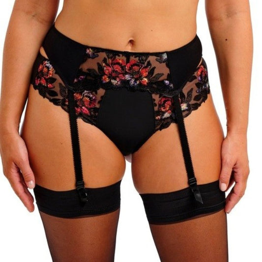 En person står model til et Fantasie Magdalena Noir sort strømpebånd med rødt og lilla blomsterbroderi, sammen med matchende sorte trusser og lårhøje strømper. Billedet er beskåret fra torso til midt på låret.