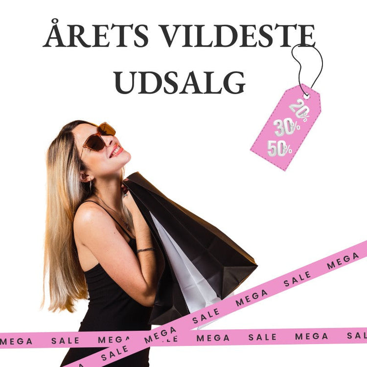 Sort baggrund med gyldne gnister. Teksten BLACK står med store, hvide bogstaver, og Friday er skrevet nedenunder med en glødende, kursiv skrift. LOVE-LINGER.DK står i nederste højre hjørne.