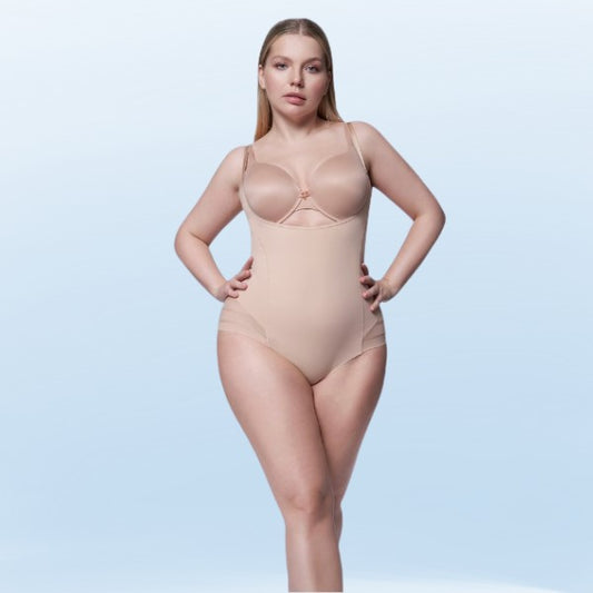 Bodyshape i beige, designet til at sidde under barmen. Aftagelige og justerbare stropper. 