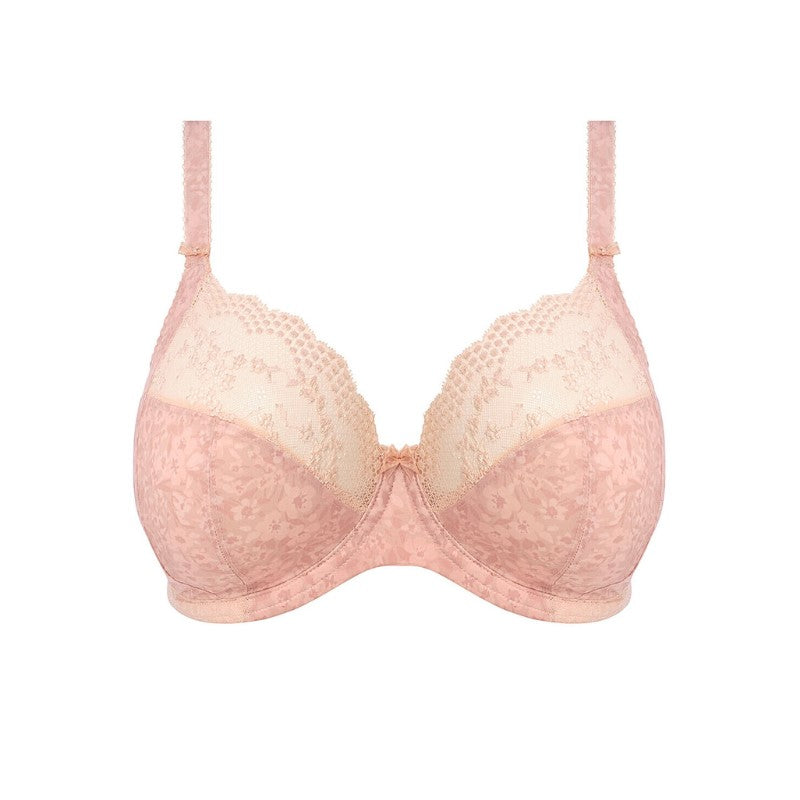 Elomi Lucie Stretch Bh'en i lyserød har bøjlestøtte, let polstrede skåle, blomsterdetaljer med blonde, en dyb halsudskæring, støttende powernet, justerbare stropper og en charmerende sløjfedetaljer.
