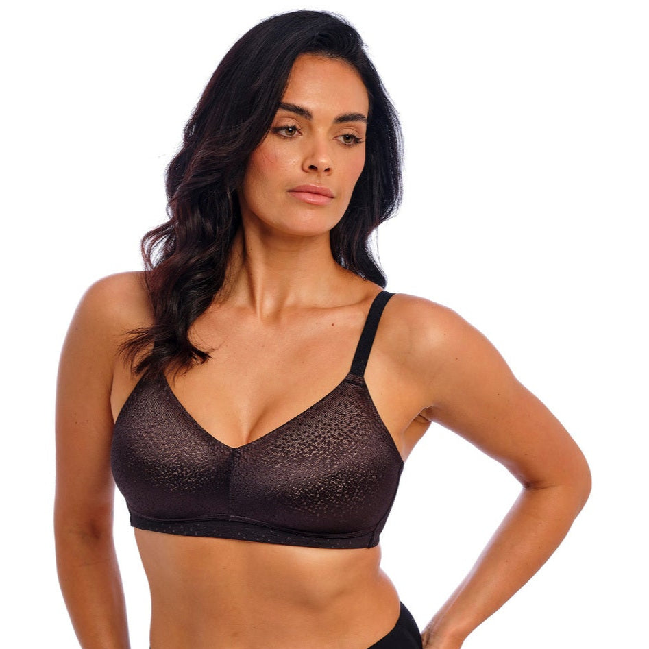 Sort bralette med diskret prikkede detaljer. Meget blødt materiale.  